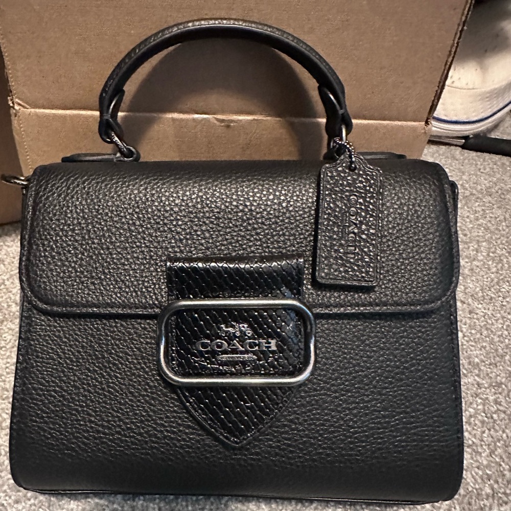 Coach Morgan Top Handle satchel.  Black pebbled leather and black hardware.